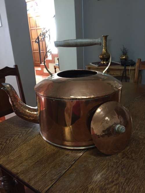 Large solid copper kettle with copper lid and brass and wood handle